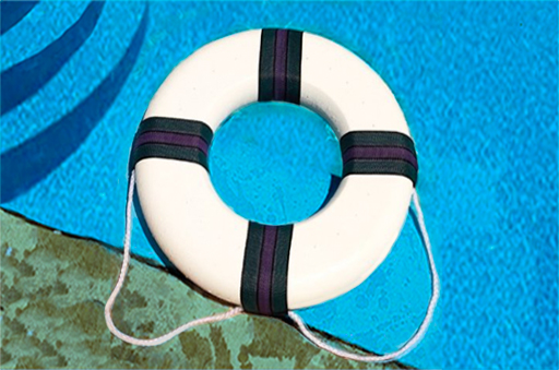 a Pool Accessories sitting on top of a blue towel.